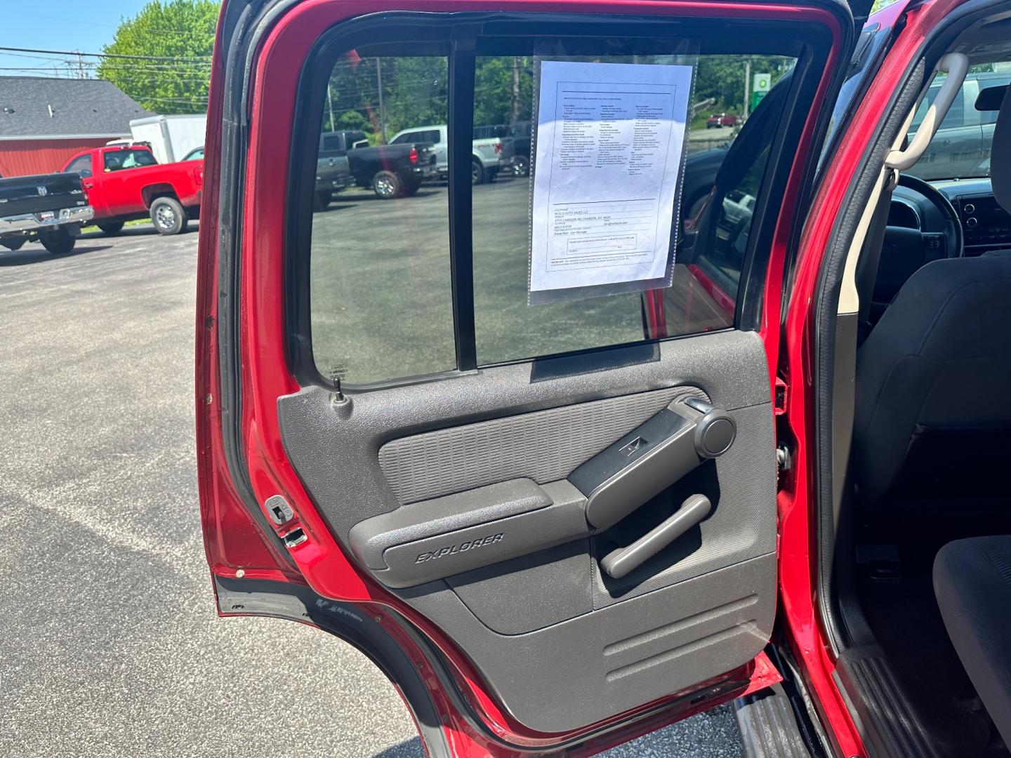 2009 Red /black Ford Explorer XLT (1FMEU73E89U) with an 4.0L V6 engine, 5-Speed Automatic transmission, located at 11115 Chardon Rd. , Chardon, OH, 44024, (440) 214-9705, 41.580246, -81.241943 - This 2009 Ford Explorer is a reliable and capable SUV, offering a 4.0L V6 engine paired with a 5-speed automatic transmission and full-time 4WD system. With a 3,500-pound towing capacity, it's suitable for moderate hauling needs. Additionally, the power driver's seat provides comfort and convenience - Photo#29